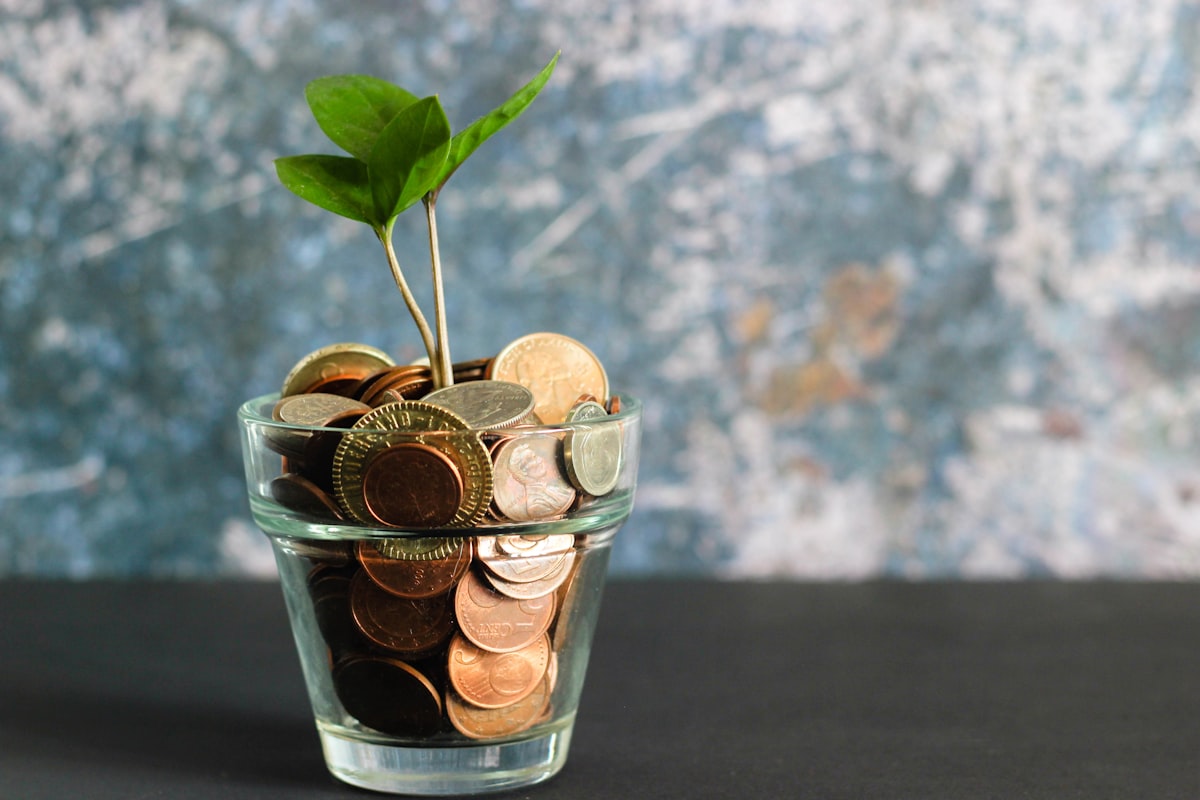 Notebook listing loan balances and monthly payment targets